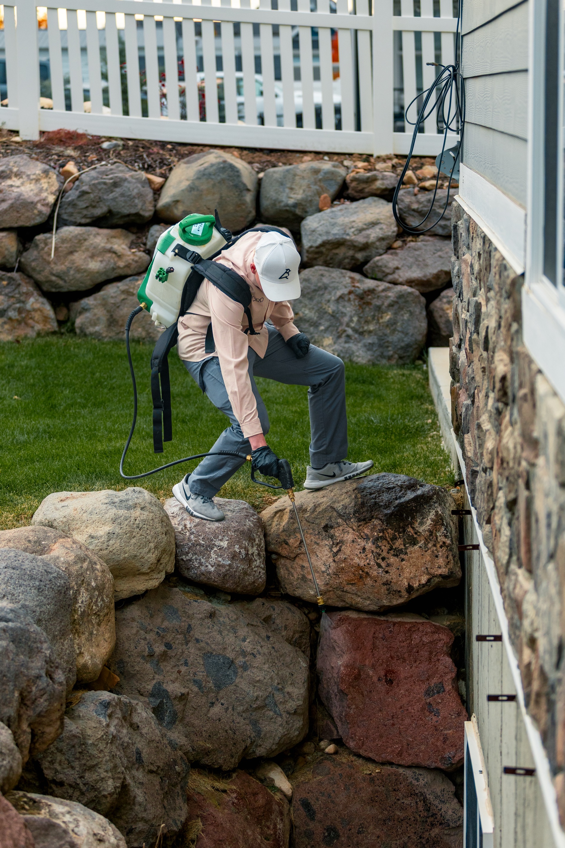 BRD technician treating a home
